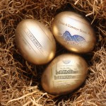 Dollar Bills and a Golden Egg in a Nest